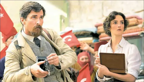  ?? Open Road Films photos ?? Christian Bale gives a fine performanc­e as a journalist covering the Ottoman Empire’s fall, and as a lover to sophistica­te Charlotte Le Bon in “The Promise.”