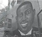  ?? SARAH BLAKE/AP ?? A mural of Ahmaud Arbery is on display in Brunswick, Ga., where the 25-year-old man was shot and killed in February 2020.