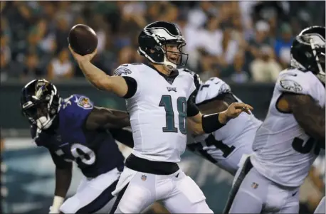  ?? MICHAEL PEREZ – THE ASSOCIATED PRESS ?? New Eagles backup quarterbac­k Josh McCown, shown throwing a pass in the first half, was the Eagles’ fans’ best source of entertainm­ent Thursday night. That’s because Carson Wentz was again not allowed to play.