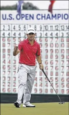  ?? STREETER LECKA / GETTY IMAGES ?? Brian Harman finishes his round of 5-under 67 Saturday with a par on 18, putting his name alone at the top of the Open leaderboar­d at 12 under.