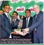  ??  ?? Akalanka Peiris the Emerging Sportsman of 2017 receiving his award from Fabrice Cavallin, Managing Director, Nestle Lanka