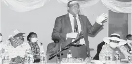  ??  ?? Minister of Finance and Economic Developmen­t, Professor Mthuli Ncube, flanked by Zanu-PF Bulawayo province interim chairperso­n Cde Obert Msindo (left) and Politburo member Cde Judith Ncube, addresses Zanu-PF Bulawayo leadership and business community of Bulawayo at Davis Hall yesterday