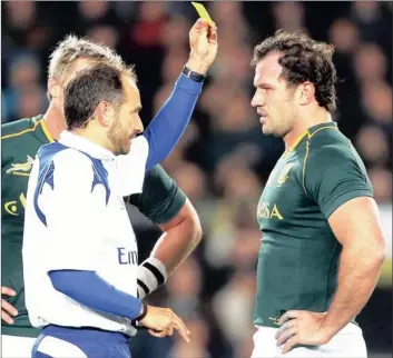  ?? PICTURE: GETTY IMAGES ?? Referee Romain Poite shows Bismarck du Plessis the first of two yellow cards, which resulted in a red card.The IRB have admitted since that the first yellow card was an incorrect call on the part of Poite.