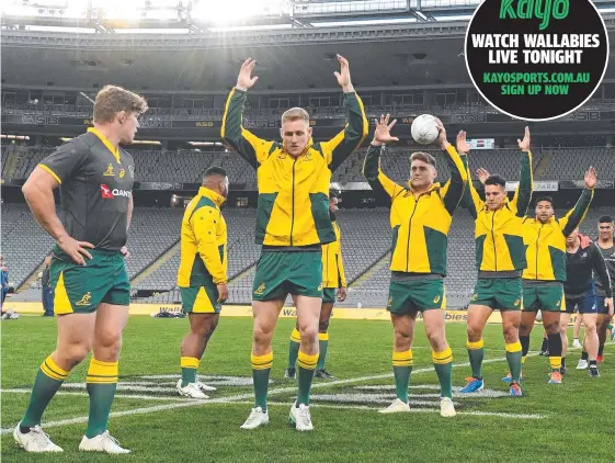  ?? Picture: AAP IMAGE ?? Captain Michael Hooper (left) looks on at Eden Park yesterday as the Wallabies prepare for Bledisloe Cup decider.