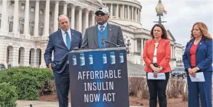  ?? SCOTT APPLEWHITE/AP J. ?? From left, Rep. Dan Kildee, D-mich., House Majority Whip James Clyburn, D-S.C., Rep. Angie Craig, D-minn., and Rep. Lucy Mcbath, D-GA., talk about their support for legislatio­n aimed at capping the price of insulin Thursday in Washington.