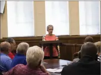  ?? Staff photo by Forrest Talley ?? Miller County Election Coordinato­r Linda Crawford explains a contract for new election equipment to Quorum Court members on Monday at the Miller County Courthouse. Cost of the new equipment will be shared by the county and the state.