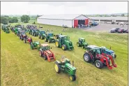  ?? COURTESY OF ANDREW FRANKENFIE­LD ?? Tractors staging before the parade.