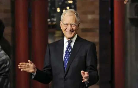  ?? JEFFREY R. STAAB/CBS /THE ASSOCIATED PRESS ?? There were no tears as a relaxed David Letterman appeared for the last time Wednesday as a late night TV host, capping a record 33-year career.