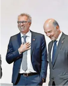  ?? APA/NEUBAUER ?? Austausch in Wien: Die Finanzmini­ster Hartwig Löger , Petteri Orpo (Finnland), Pierre Gramegna (Luxemburg) mit EU-Kommisar Pierre Moscovici