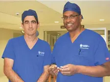  ?? Photos: Contribute­d ?? TOOWOOMBA FIRST: All smiles after finishing their first surgery yesterday are (left) Sydney ENT surgeon Dr Sean Flanagan, and St Vincent's ENT surgeon, Dr Suresh Mahendran.