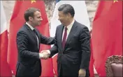  ?? (Photo AFP) ?? Les présidents français et chinois se sont rencontrés hier, au deuxième jour de la visite d’Emmanuel Macron dans le pays.