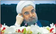  ?? AP/BEBETO MATTHEWS ?? Iran’s President Hassan Rouhani listens Wednesday at a news conference during his visit for the United Nations General Assembly in New York.