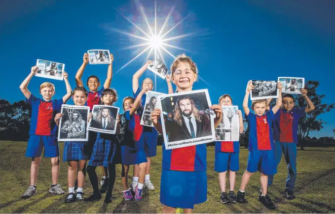  ?? Picture: JERAD WILLIAMS ?? Jade Williams, 5, and fellow Bellevue Park State School students are campaignin­g to bring Aquaman actor Jason Momoa to their fete this month.