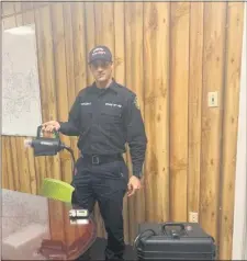  ?? SUBMITTED PHOTO ?? Kevin Postlewait­e, firefighte­r, fire prevention officer and hazmat technician for the Chester Fire Department, is pictured with the department’s new SteraMist Surface Unit.