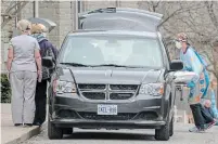  ?? FRANK GUNN THE CANADIAN PRESS ?? A body is loaded into a van at Anson Place Care Centre in Hagersvill­e on Wednesday.