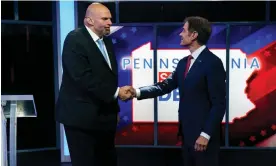  ?? Photograph: Greg Nash/EPA ?? John Fetterman and Dr Mehmet Oz greet each other. Tuesday’s Pennsylvan­ia Senate debate was the Democrat candidate Fetterman’s most high profile appearance since suffering a stroke in May.