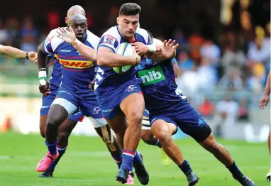  ??  ?? NICE TRY: Bryan Gatland tries to stop Damien de Allende at Newlands on Saturday.