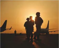  ?? —AP ?? LIMA: Soldiers guard the military airport during the arrival of leaders that will participat­e in the APEC summit in Lima, Peru on Friday.