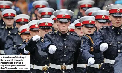  ?? Gareth Fuller ?? Members of the Royal Navy march through Portsmouth during a Royal Navy Freedom of the City parade