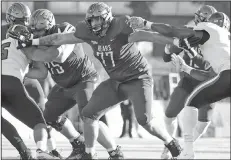  ?? Central Arkansas Sports Informatio­n ?? Clearing a path: Central Arkansas offensive lineman Hunter Watts clears a path during a game in the 2018 season.