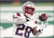  ?? Bill Kostroun / Associated Press ?? Back with the Patriots on a one-year deal, veteran RB James White is ready for a fresh start on and off the field.