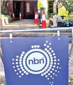  ??  ?? Workers install cables for the Australian National Broadband Network (NBN) at an apartment block in Sydney,Australia.Australia’s government-built US$36 billion broadband network, already under attack from underwhelm­ed customers, has found a new and...