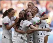  ?? FRANCISCO SECO - THE ASSOCIATED PRESS ?? United States’ Rose Lavelle, center, celebrates after scoring her side’s second goal during the Women’s World Cup final soccer match between US and The Netherland­s at the Stade de Lyon in Decines, outside Lyon, France, Sunday, July 7, 2019.
