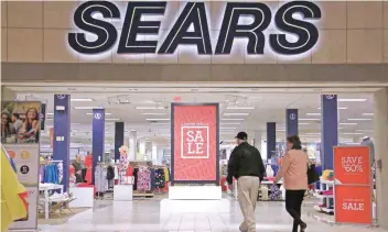  ?? — Reuters ?? Shoppers walk into a Sears store in Pittsburgh, Pennsylvan­ia.