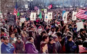  ?? AP ?? Thousands of Wisconsin activists gathered in Milwaukee’s predominan­tly Hispanic South Side to protest the sheriff’s plans to crack down on illegal immigratio­n. —