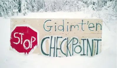  ?? THE CANADIAN PRESS/FILES ?? A blockade checkpoint establishe­d by the Gidimt’en clan of the Wet’suwet’en First Nation has become the latest flashpoint in the debate over Canada’s approval process for resource-developmen­t projects.