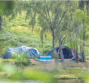  ?? Picture: Steve MacDougall. ?? Wild campers by Loch Tummel at the weekend.