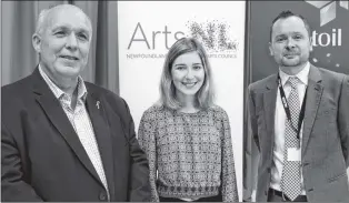  ??  ?? St. John’s teenager Gwenyth Puddester (centre) was chosen as the 2017 Statoil Artssmarts Scholarshi­p winner. She was presented with the award during a ceremony at St. Mary’s Elementary on Thursday morning by Statoil Canada president Paul Fulton (left)...