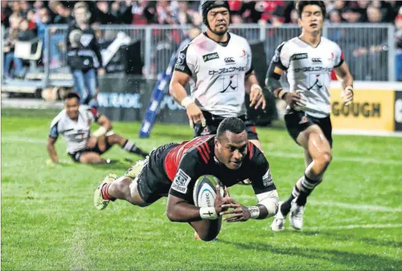  ?? Photo: Martin Hunter/AFP ?? Captain’s crusade: Manasa Mataele of the Crusaders dives to score a try in the Super Rugby match against the Sunwolves.