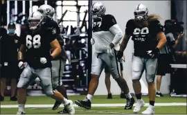  ?? CHASE STEVENS — LAS VEGAS REVIEW-JOURNAL ?? Las Vegas Raiders offensive tackle Trent Brown, center, warms up alongside offensive tackle Andre James (68) and guard Jordan Roos on Wednesday.