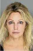  ??  ?? Heather Locklear gerät immer wieder in Konflikt mit dem Gesetz. Dieses Polizeifot­o entstand nach einer Festnahme im Jahr 2008.