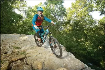  ?? NWA Democrat-Gazette/BEN GOFF • @NWABENGOFF ?? Jordan Sauls of Centerton rides the Rock Solid trail July 20 at Coler Preserve in Bentonvill­e. Sauls is one of the top young female mountain bikers in Northwest Arkansas and a member of the Bentonvill­e West NICA team.