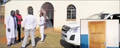  ?? (Pics: Sithembile Hlatshwayo) ?? Secretary General at the St Joseph’s Christian Church in Zion Maswazi Gama (L) and Derrick Mavuso (facing away from the camera) having a conversati­on outside the church which is now a subject under dispute.