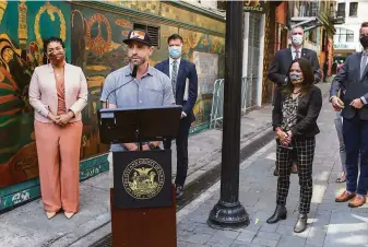  ?? Jana Asenbrenne­rova / Special to The Chronicle ?? Ben Bleiman, founder of the SF Bar Owner Alliance, joins Mayor London Breed and health director Dr. Grant Colfax, to announce new vaccine regulation­s for some indoor activities.