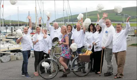  ??  ?? Hats off to Dingle Food Festival as Claire McDonnell on her bike joins chefs, Mark Murphy, Cristina Ni Mhorain, Kathleen Sheehy, Jim Lenehan, Laurence Wetterwald, Marie Charland, Ed Mulvihill, Kathleen McHugh, Helen Heaton, Trevis Gleason, and Martin...
