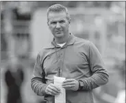  ?? AP FILE PHOTO ?? Ohio State has placed head football coach Urban Meyer on paid administra­tive leave while it investigat­es claims that his wife knew about allegation­s of abuse against an assistant coach years before he was fired last week.