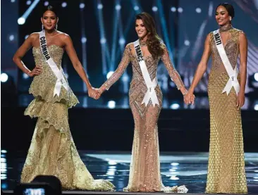  ?? — AFP ?? A scene from the Miss Universe finals in Manila in January. Are such beauty pageants empowering? Our columnist doesn’t think so.