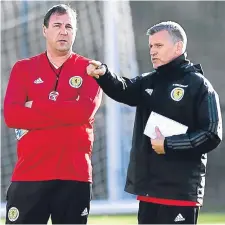  ??  ?? Interim Scotland boss Malky Mackay (left) and Eric Black.