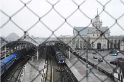  ??  ?? BREST: A picture taken on December 21, 2016 shows a commuter train carrying Chechen asylum seekers leaving the Belarusian border city of Brest for the Polish town of Terespol. — AFP