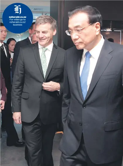  ?? Picture / Nick Reed ?? Bill English and Li Keqiang visited Fisher &amp; Paykel Appliances in Auckland.