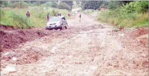  ?? (Pics: Phiwase Phungwayo) ?? Vehicles cannot travel on the slippery road, as they get stuck in mud.