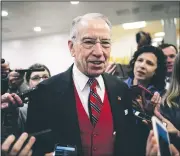  ?? AP/J. SCOTT APPLEWHITE ?? Sen. Chuck Grassley, R-Iowa, speaks with reporters Thursday following a vote at the Capitol in Washington. The Senate Judiciary Committee, which Grassley chairs, is finishing its investigat­ion into the meeting between Russians and President Donald...