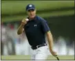  ?? MATT SLOCUM — THE ASSOCIATED PRESS ?? Jordan Spieth reacts after his putt on the 16th hole during the first round at the Masters golf tournament Thursday in Augusta, Ga.
