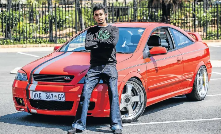  ?? Pictures: SIMPIWE NKWALI ?? JUST LOOK AT ME NOW: Rishen Naidoo put a lot of work into restoring his 2003 Opel Astra Turbo coupé, which he found in a scrapyard