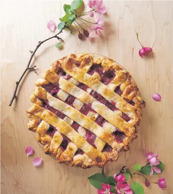  ?? AMANDA GALLANT/AG PHOTOGRAPH­Y ?? Inspired to make something special for those you love? Try pie! “It’s beautiful, easy and really lovely for Valentine’s Day,” Giselle Courteau says of the red-hued, lattice-topped treat.