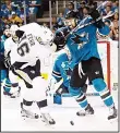  ??  ?? Pittsburgh Penguins right wing Eric Fehr (16) looks toward the puck next to San Jose Sharks defenseman Brenden Dillon during the first period of Game 3 of the NHL hockey Stanley Cup Finals in San Jose, California on
June 4. (AP)